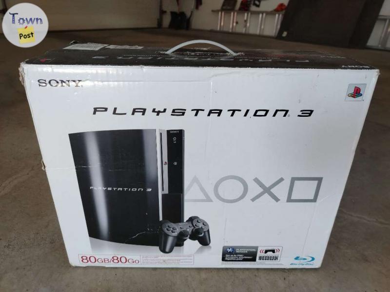 Photo of Playstation 3 80GB, with 20 games