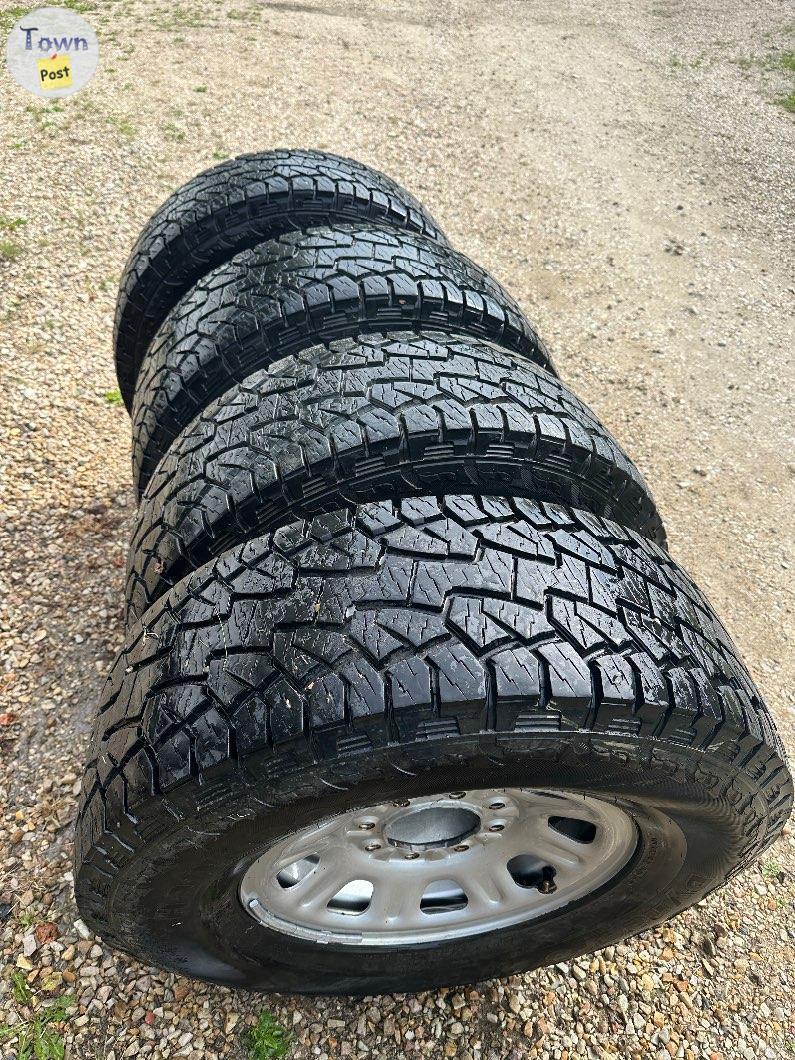 Photo of Handbook LT 325/65R18.    8 bolt 180. GMCRims wi