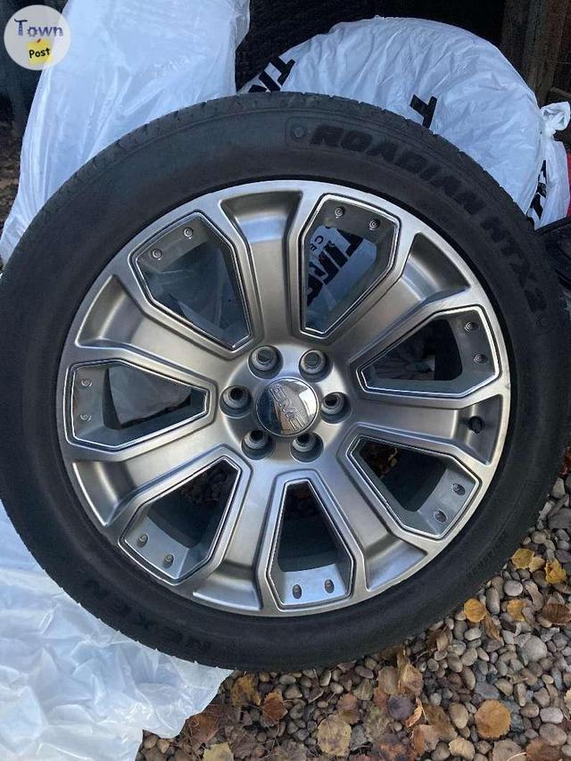 Photo of GMC Denali OEM Rims 285/45 22"